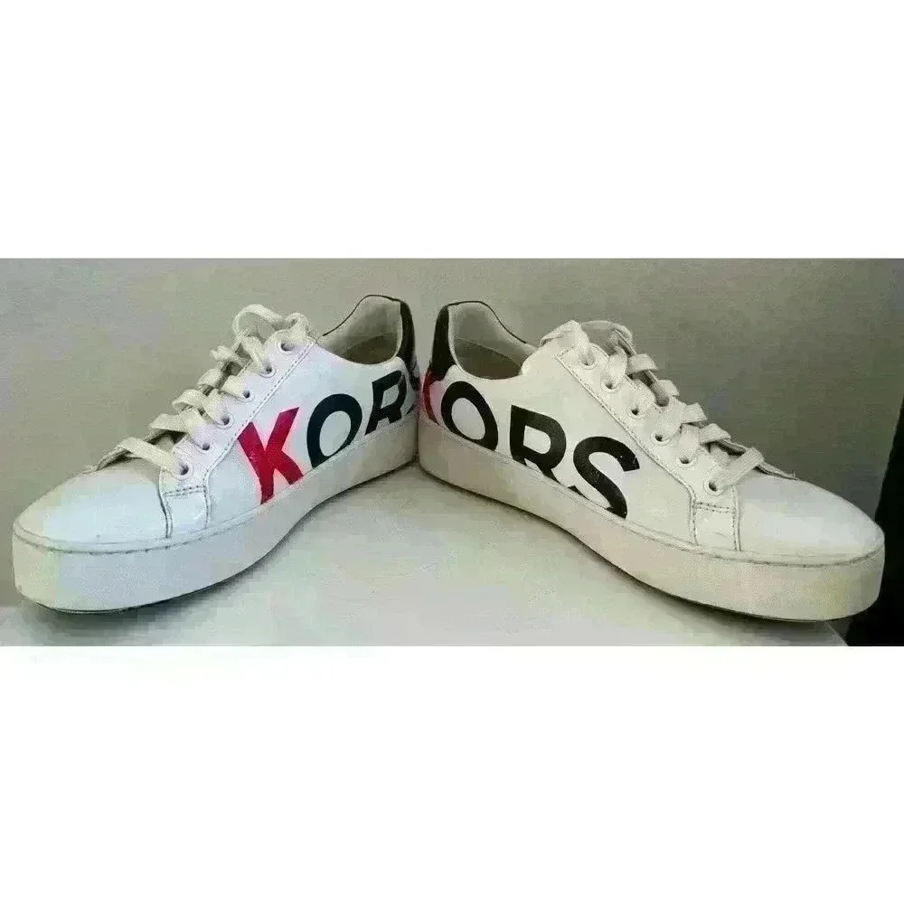 Michael Kors leather sneakers logo wrap around size. 7M  patent leather on back